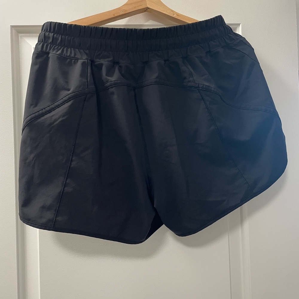 Black track that short lululemon size 12